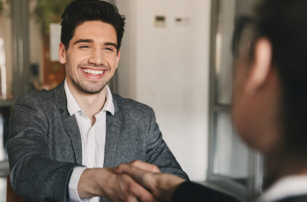 Two businessman shaking hands